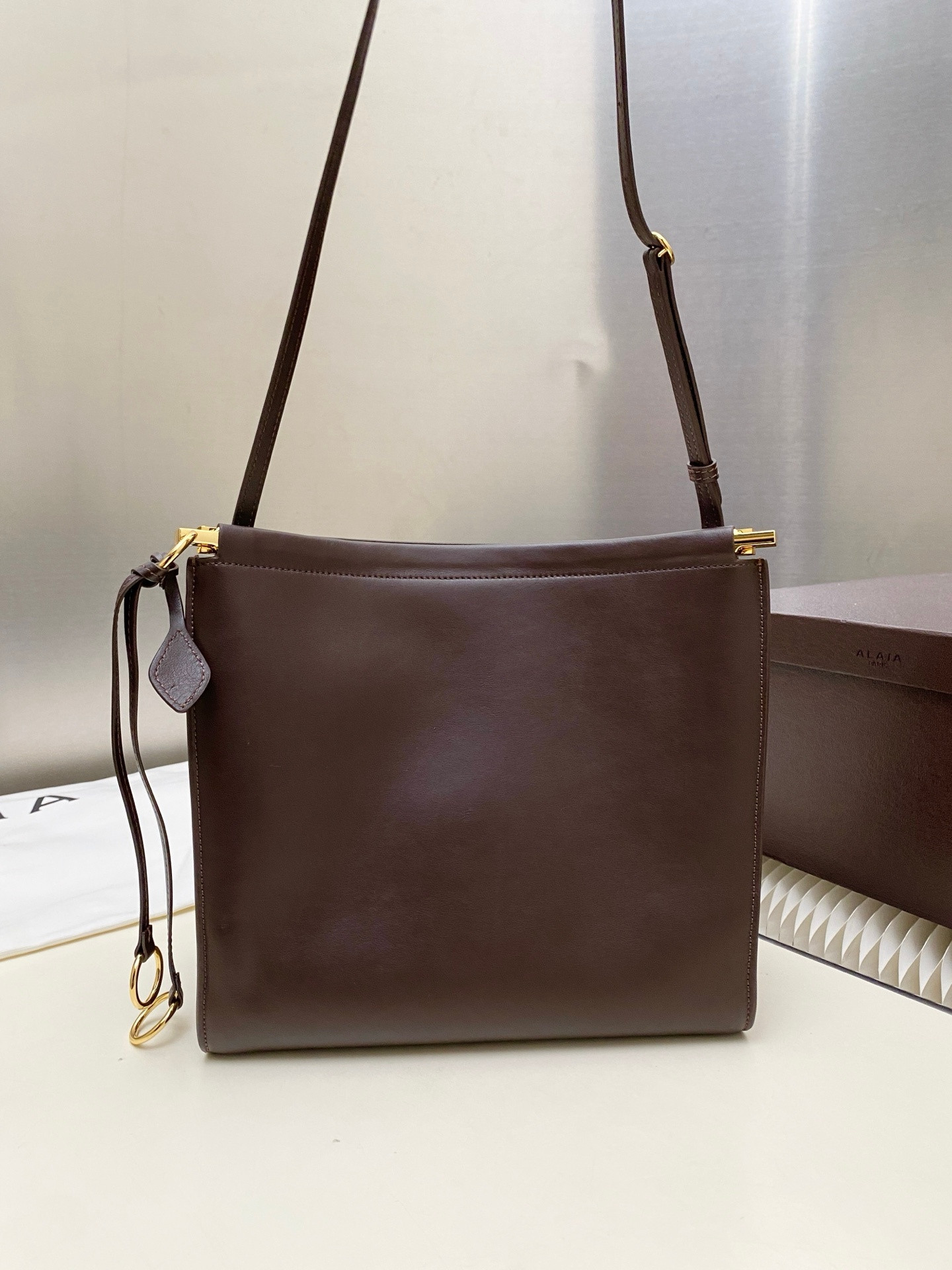 ALAÏA LE CLICK SQUARE BAG IN NUBUCK 26x14x24cm