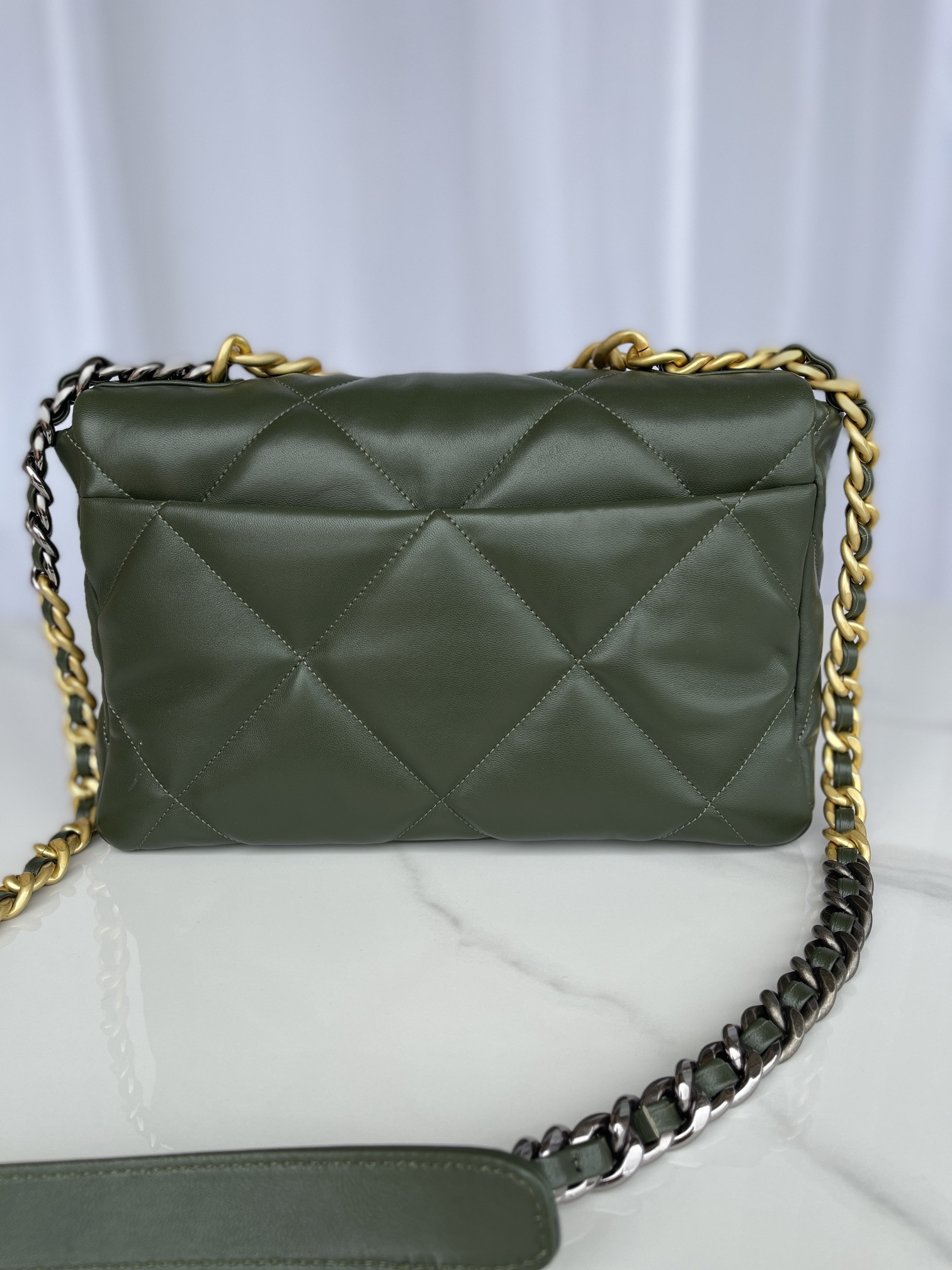 Ch*el 19 large handbag shiny leather, gold-tone, silver-tone & ruthenium-finish metal dark green 7.8 × 11.7 × 3.9 in