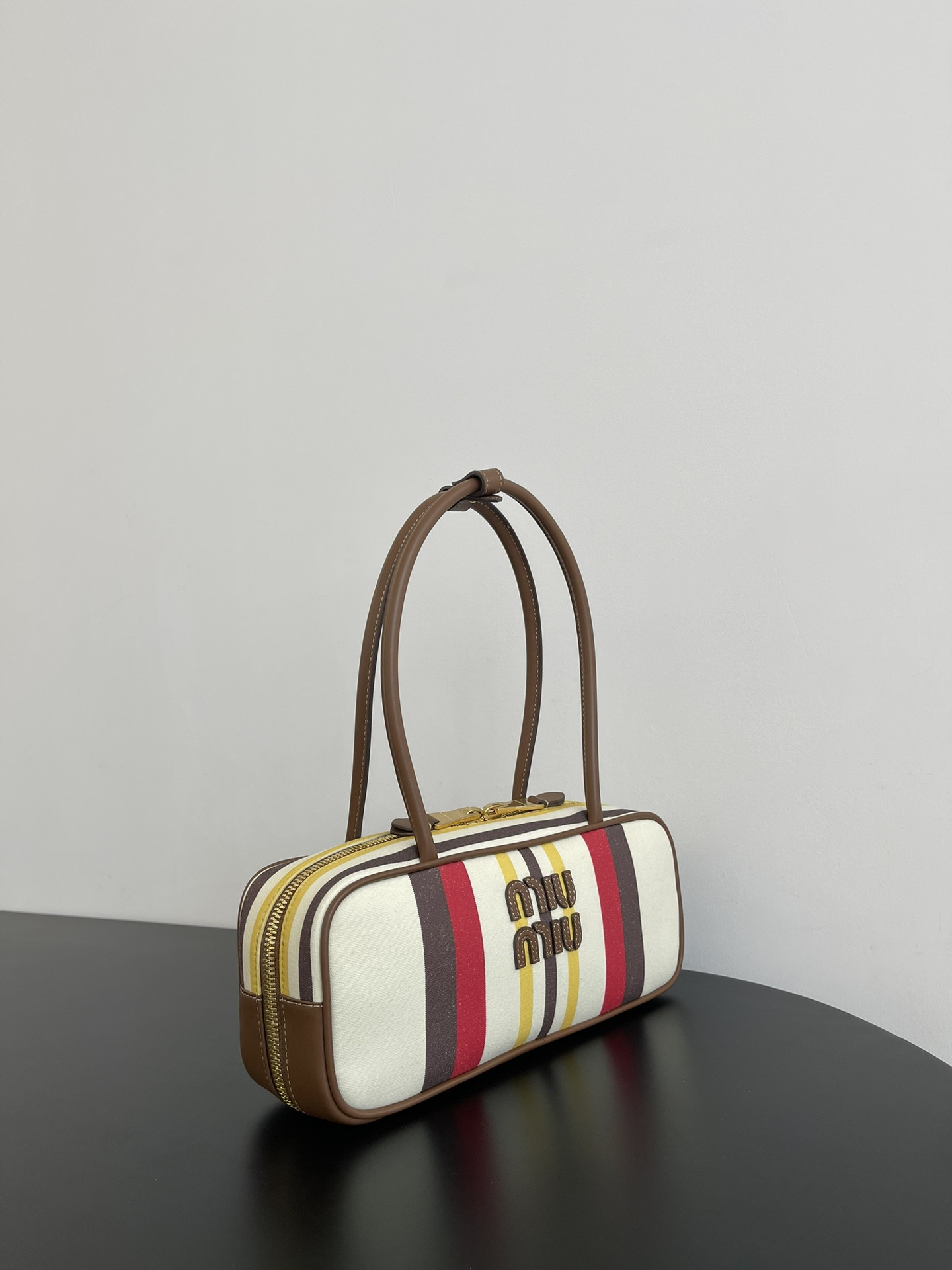 Miu Miu Beau canvas and leather bag 11.5x28x8cm
